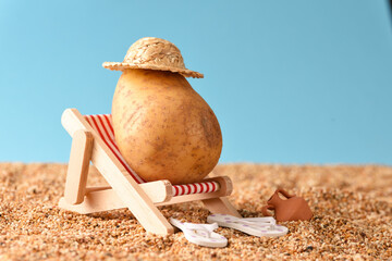 Potato  on the sunbed, conceptual photo vacation in the sun.