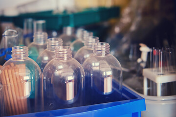 Tubes and vessels in the cabinet of the environmental laboratory, close-up