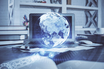 Multi exposure of table with computer and world map hologram. International data network concept.