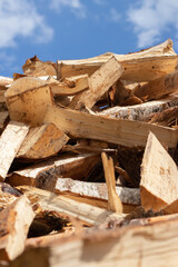 A pile of chopped birch firewood. Harvesting for the winter.
