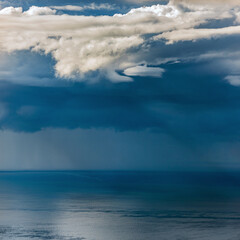 Obraz premium aerial view over the sea and evening clouds