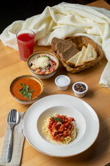 Cafe lunch with italian pasta and vegetable tomato sauce