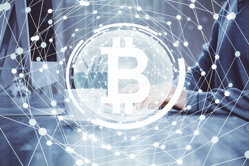 Blockchain theme hud with businessman working on computer on background. Concept of crypto chain. Multi exposure.