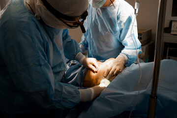 Chest augmentation plastic operation and correction in medical clinic. Surgeon touches and check...