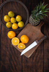 fruits arranged on a rustic wooden surface with a black background. selective focus.