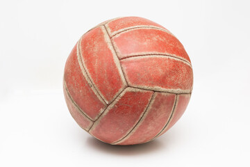 old leather soccer ball on white background