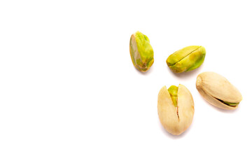 Pistachio nuts on a white background