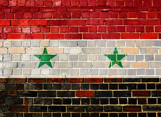 Syria flag on a brick wall