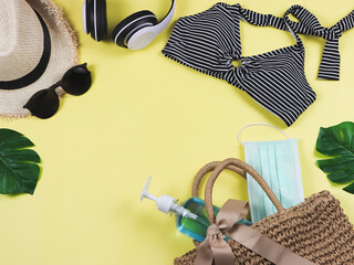 COVID-19 prevention , summer and new normal concept, top view of   bikini swim wear  and women's...