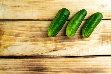 Cucumbers on a wooden surface