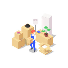 Home moving concept. A set of packed boxes with various household items and a loader holding a box in his hands.