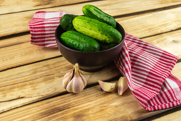 Cucumbers on a wooden surface