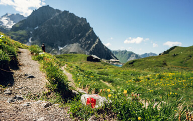 Trail marking on mountains. Painted mark in red and white for tourist, hikers and trekkers. It...