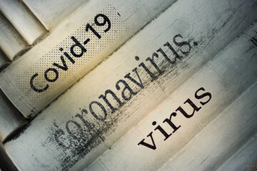 Distressed newspaper headline reading Covid 19 virus