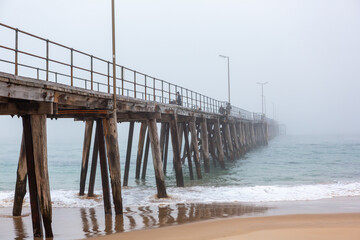 The port noarlunga jetty with a heavy morning fog in port noarlunga south australia on july 14 2020