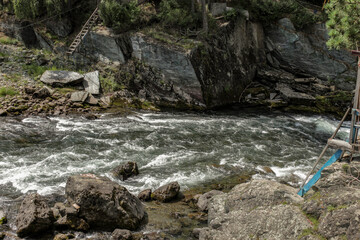 The descent of the mountain river among the rocks.