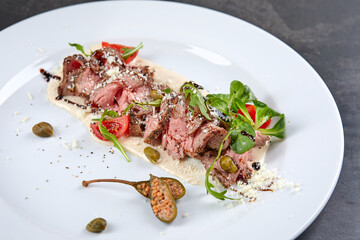 beef with celery puree and salad