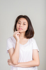 Fototapeta na wymiar Portrait of young beautiful Asian teenage girl with short hair