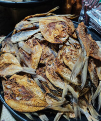 Salted fish, such as kippered herring or dried and salted cod