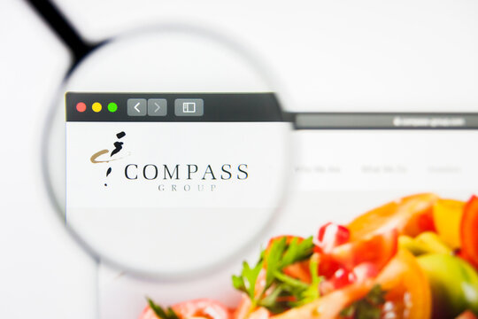 Los Angeles, California, USA - 8 April 2019: Illustrative Editorial of Compass Group website homepage. Compass Group logo visible on display screen.