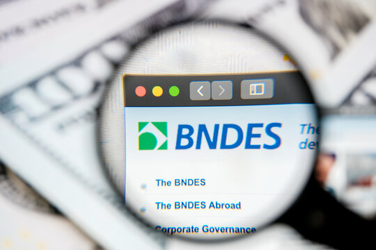 RUSSIA, ST.PETERSBURG - August 12, 2020: logo Brazilian Development Bank - BNDES on the website screen through a magnifier.