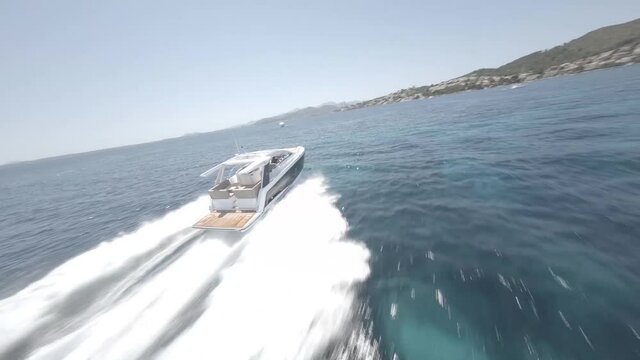 Drone shoot following motor boat