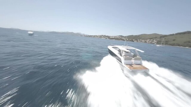 Drone shoot following motor boat