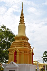 Fototapeta premium Golden pagodas on the sky background