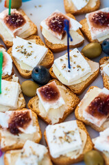 Snacks. Buffet, aperitif. The food is kind of close. Olives