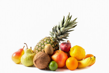 Tropical fruits assortment isolated on white background. Pineapple, coconut, bananas, mango, kiwi, lime, lemon, pears, grapefruit