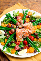 Seafood salad. Classic Italian or Greek restaurant appetizer favorite. Cold seafood salad made with fresh organic shrimp, octopus, squid mixed with red bell peppers garlic and onions.