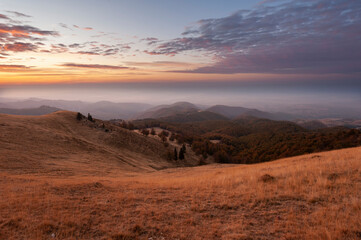 Fototapeta na wymiar Eerie sunrise in a mountain area in Romania.