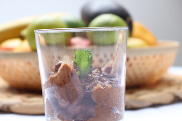 glass of chocolate mousse with menthe 