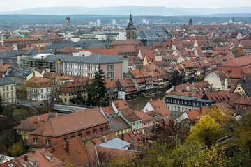 View of traditional houses with typical red tiled rooftops in Bamberg, Bavaria, Franconia, Germany....