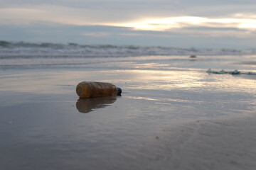 Plastic water bottles, garbage, pollution, left on the beach Environmental protection (Environmental concept Natural treatment)