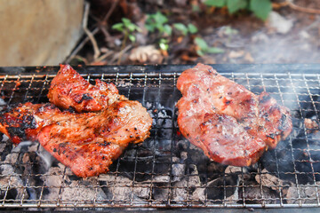 Roast pork on the grill