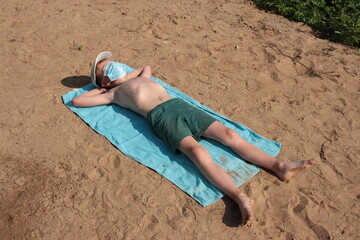 young man on the beach