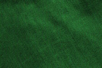 Green worn jeans cloth texture. Abstract background and texture for design. Jeans texture - Green cotton background