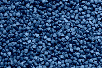 Fototapeta na wymiar Pile of small gravel stones in blue tone. Abstract small blue stones background.