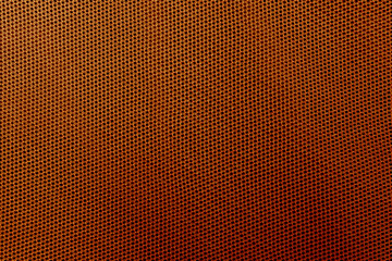 Brown fabric sport clothing football jersey with air mesh texture background. Brown fabric sport clothing football jersey with air mesh texture background close up