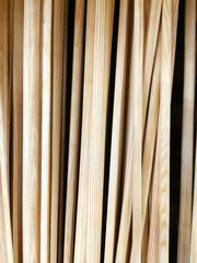 Several sheets of new clean plywood in a stack. Sale of goods for repair and decoration. Wood and texture. Abstract background and shallow depth of field.