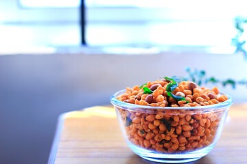 Kerala snacks (khara bhoondi) on glass bowl