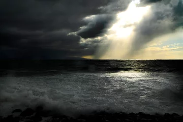 Deurstickers storm clouds over the sea © antonio