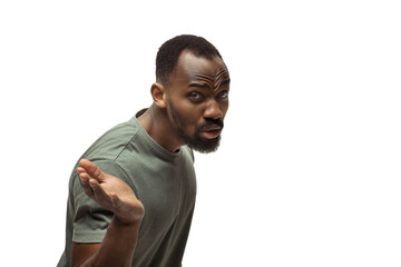 WHAT. Young african-american man with funny, unusual popular emotions and gestures on white studio background. Human emotions, facial expression, sales, ad concept. Trendy look inspired by memes.