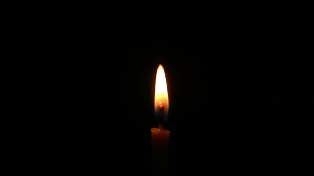 candle light on isolated black background