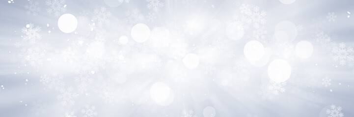 wide white and gray Christmas light with snowflake bokeh background, Winter backdrop wallpaper.