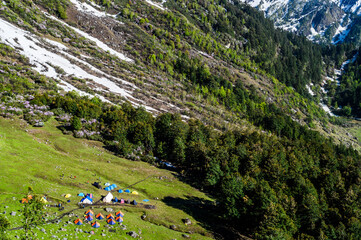 Mountain landscape with green grass, meadows scenic campingHimalayas peaks & alpine from the trail...