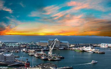 V & A waterfront and harbour at sunset in Cape Town South Africa