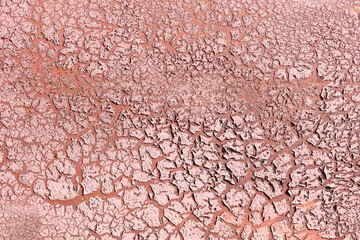 Old rusty metal surface  brown paint flaking and cracking texture. Rust on old colored metal. 