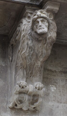 console of balcony in the form of lion with face man © DenisDavidoff